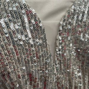 I just wore this once for a party. No stains/wear&tear